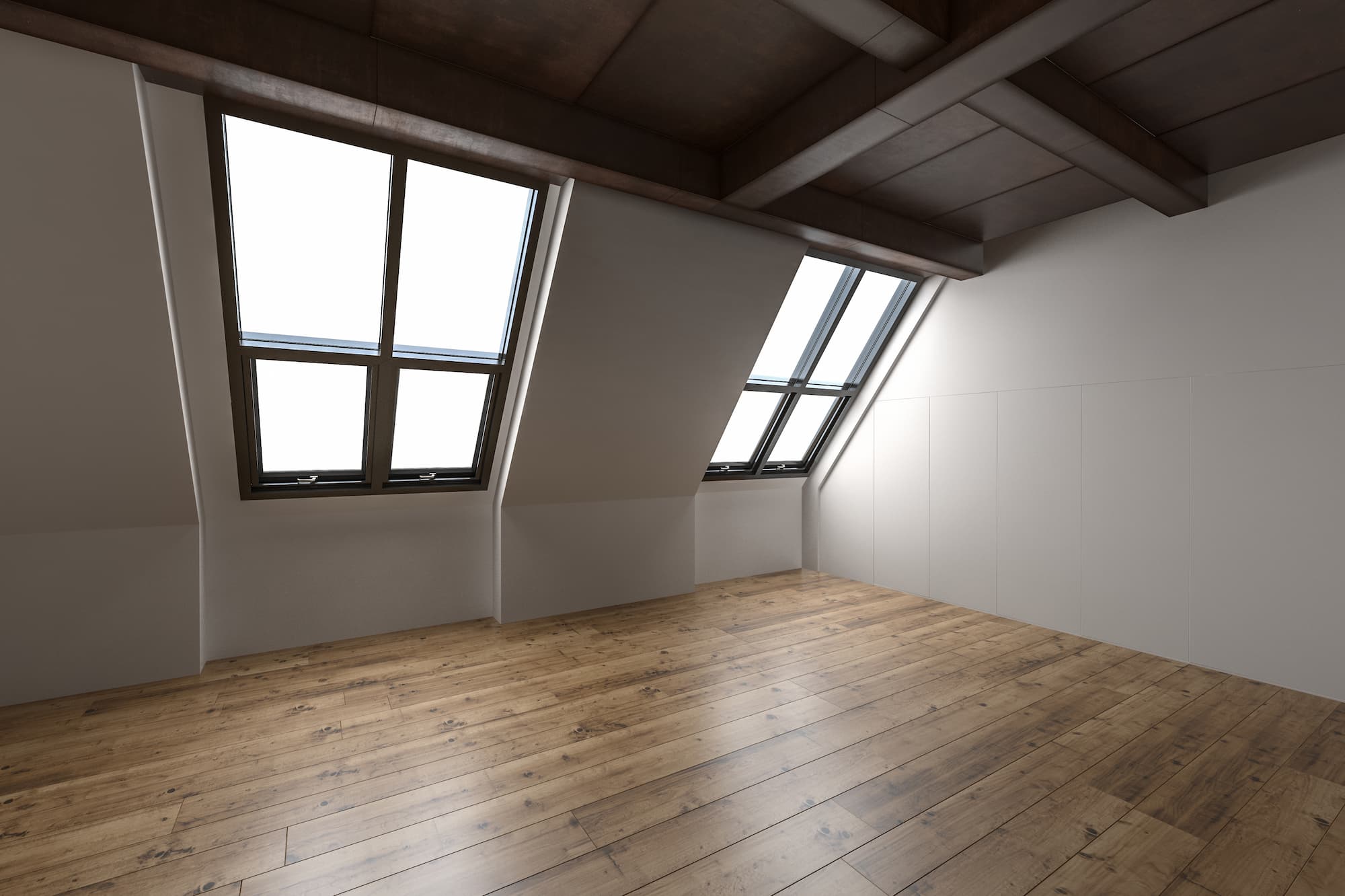 Finished loft conversion with rooflight windows, vaulted ceiling, exposed timber beams and natural wood flooring completed by Sunny Build in Kingston.